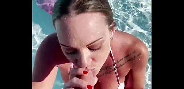  Big tits blonde Tiffany Leiddi gives a sensual BJ in the pool